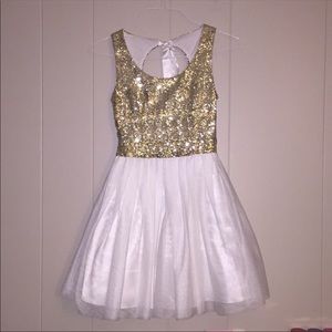 White and gold sequin dress
